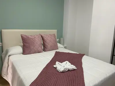 Cama o camas de una habitación en El Mirador De San Fernando