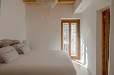 Cama o camas de una habitación en Hommyhome Sevilla Natural Passivhaus