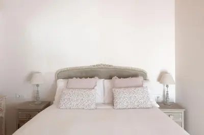 Cama o camas de una habitación en Hommyhome Sevilla Natural Passivhaus