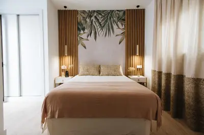 Cama o camas de una habitación en Magno Apartments Azafrán