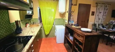 Una cocina o zona de cocina en Chalet rural La Solana, a 12 Kilómetros de Córdoba en plena sierra, con piscina