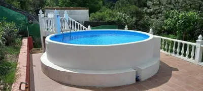 Piscina en o cerca de Chalet rural La Solana, a 12 Kilómetros de Córdoba en plena sierra, con piscina