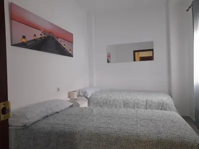 Cama o camas de una habitación en CASA INDEPENDIENTE EN NERVION JUNTO A PARADA DEL METRO