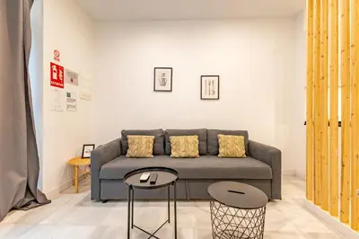 Zona de estar de Resolana Suites