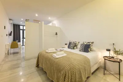 Cama o camas de una habitación en Resolana Suites