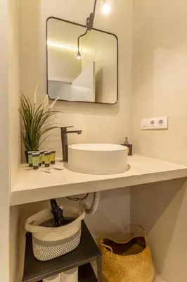 Un baño de Resolana Suites