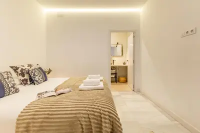 Cama o camas de una habitación en Resolana Suites