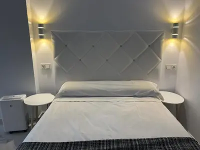 Cama o camas de una habitación en Casa Puerta de Almodovar