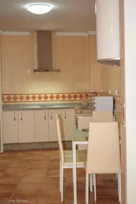 Una cocina o zona de cocina en Modern Apartment in Peñaflor with Air Conditioning - 85 m²