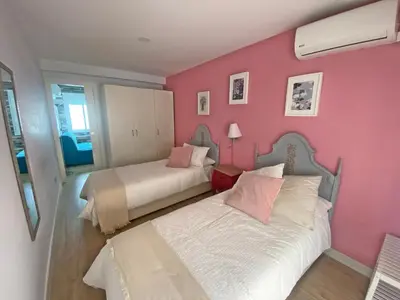 Cama o camas de una habitación en Amplio piso en el mágico barrio de Santa Cruz