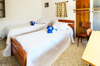 Cama o camas de una habitación en Casa Carmen, Montefrio