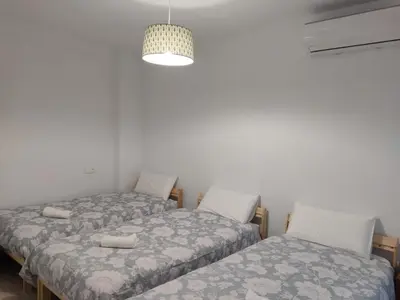 Cama o camas de una habitación en Guimar Momentos, vívelos en Córdoba