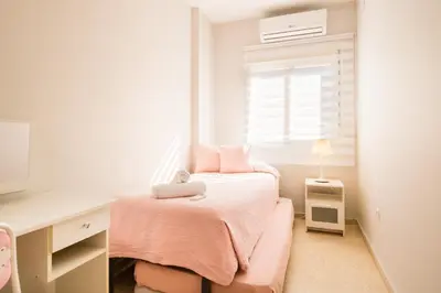 Cama o camas de una habitación en Casa unifamiliar