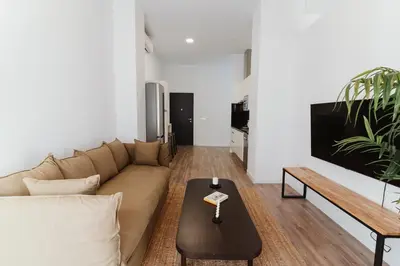 Zona de estar de One&Lux Puñonrostro Bright Minimalist Central Home