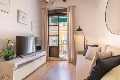 Una televisión o centro de entretenimiento en ISG Apartments Relator