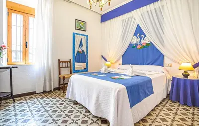 Cama o camas de una habitación en 4 Bedroom Awesome Home In Zafarraya