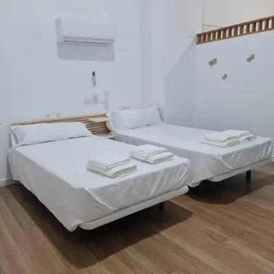 Cama o camas de una habitación en La Victoria 3