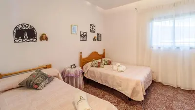 Cama o camas de una habitación en Complejo Residencial Barquero Pernía Cañete la Real by Ruralidays