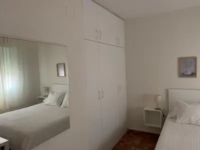 Cama o camas de una habitación en APARTAMENTO PLAZA ESPAÑA