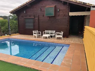 Piscina en o cerca de Casa de madera el oasis el palomar