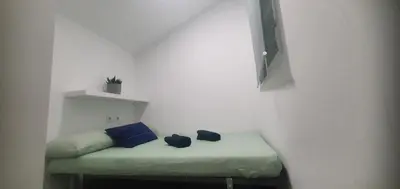 Cama o camas de una habitación en #4# Apartamento Familiar Sevilla Centro