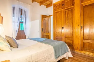 Cama o camas de una habitación en Apartamento Macarena, en el Centro de Sevilla - cerca de Catedral e Isla Mágica