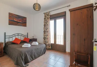 Cama o camas de una habitación en Casa Mirador de los Tomillos
