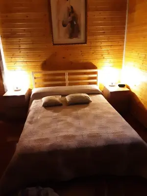 Cama o camas de una habitación en La Cabaña