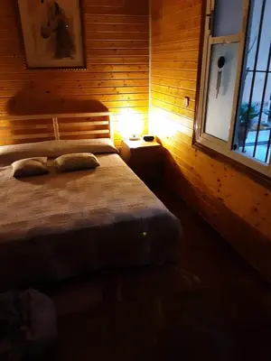 Cama o camas de una habitación en La Cabaña