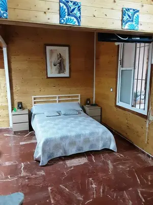 Cama o camas de una habitación en La Cabaña