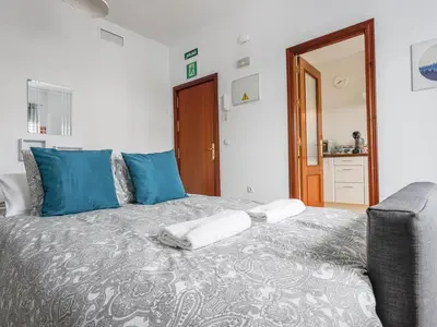 Cama o camas de una habitación en Alcalá del Rio! 1A