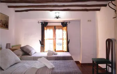 Cama o camas de una habitación en Cozy Home In Villanueva Del Rosario