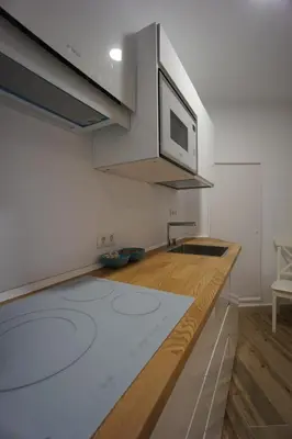 Una cocina o zona de cocina en RentalSevilla Espacioso y acogegor apartamento de 3 dormitorios