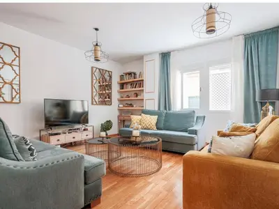 Zona de estar de Exclusivo Duplex con terraza en Sevilla