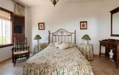 Cama o camas de una habitación en 6 Bedroom Cozy Home In Lucena