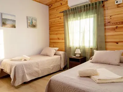 Cama o camas de una habitación en Holiday Home La Pedriza by Interhome