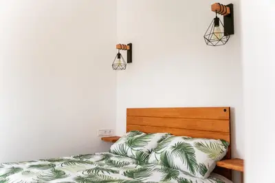 Cama o camas de una habitación en Alojamiento Rural con jacuzzi privado