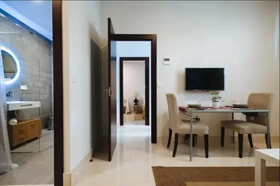 Una televisión o centro de entretenimiento en Acogedor Apartamento José Laguillo.