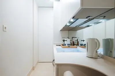 Una cocina o zona de cocina en Acogedor Apartamento José Laguillo.