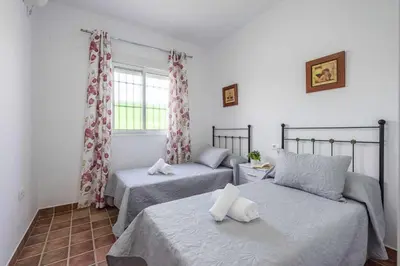 Cama o camas de una habitación en Casa Rural Brisa del Valle