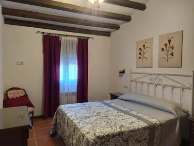 Cama o camas de una habitación en Casa Rural Alamillo