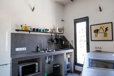 Una cocina o zona de cocina en La Bermeja, Alojamiento completo, terraza con bañera y vistas panorámicas