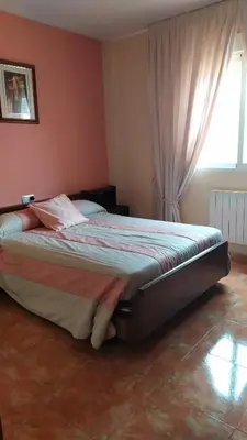 Cama o camas de una habitación en El Santo