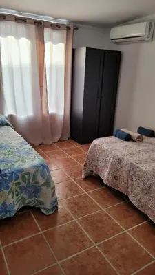 Cama o camas de una habitación en VILLA HISPANO-BRASILEÑA SALAR 2