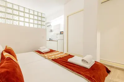 Cama o camas de una habitación en ISG Apartments Encantador estudio en Alameda de Hércules