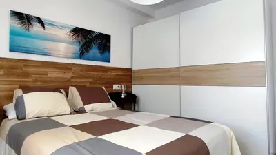 Cama o camas de una habitación en Selecta 3 dormitorios junto a Sanchez Pizjuan