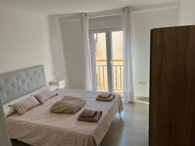 Cama o camas de una habitación en PISO CENTRO CON VISTAS ANTEQUERa