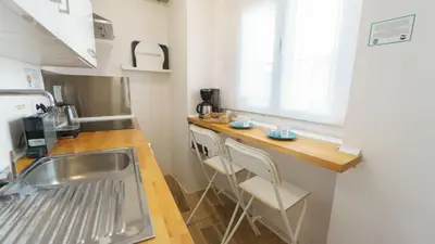 Una cocina o zona de cocina en Recién reformado en el centro de Sevilla