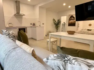 Una cocina o zona de cocina en Apartamentos El Olivo