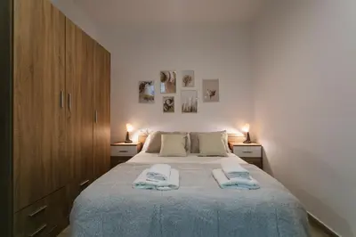 Cama o camas de una habitación en One&Lux San Luis Feel at Home in a Renovated Apartment